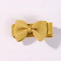 Small mustard yellow grosgrain ribbon bow hair clip for toddler girls bangs accessory - Ginger Yellow