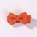 Mini orange grosgrain ribbon bow hair clip for girls, cute candy colored hair accessory. - Orange