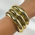 Set di tre bracciali rigidi dorati lucidi e arrotondati per un look minimalista - 31666-bra-G-1