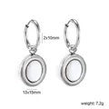 Detailed view of minimalist stainless steel hoop earrings with white shell inlay - Earrings (EA583901S) / Steel