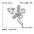 Elegante broche de mariposa en tono plateado para mujer con cristalli y medidas de tamaño. - Blanco