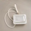 Close-up of elegant pearlescent acrylic clutch bag with pearl chain and wrist strap. - Dumpling Shape White