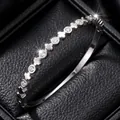 Silver stainless steel bangle bracelet with clover motifs and pavé stones in gift box - Clover Zirconia Inlaid (42-C-3) / Steel