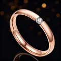 Elegant rose gold titanium steel ring featuring a single sparkling center stone. - Size 7 / Rose Gold