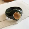 Exaggerated dark green acrylic bangle featuring a marbled amber stone in a gold rim - Geometric Open Style (18#)