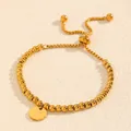 Élégant bracelet en perles d'acier titane doré avec cordon réglable et disque lettre T - Style Lettre T (238224) / Or