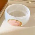 Wide white acrylic bangle with pink marbled oval inlay and gold trim decoration - Geometric Open Style (34#)