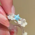 Detailed view of a vintage palace style ring with blue star, pearls and zircons - Starfish Pearl Combination (17#) / Silver Blue