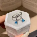 Elegant vintage silver knot ring featuring two light blue triangle zircons - Twisted Rope Bow Style (33#) / Blue