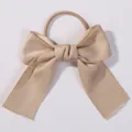 Elegant champagne colored swallowtail bow hair tie for girls made of soft ribbon material - Champagne (2)