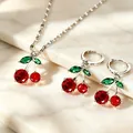 Detailed view of cherry jewelry set featuring red faceted stones and silver finish - Silver Cherry (DZ-875)
