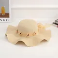 Sweet beige straw sun hat with large wavy brim and flower ribbon for beach vacations - Coffee Heart (solid Color) Beige
