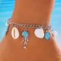 Elegante cavigliera boho con conchiglia naturale, ciondoli medusa blu e tartaruga - Cavigliera Stile Oceano con Ciondoli Medusa e Tartaruga Blu