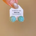 Macro detail view of round turquoise stone stud earrings with silver 925 display card - Round Blue Agate Style / Blue