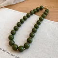 Detail of olive green acrylic chunky beaded necklace on textured linen background - Olive Green (73#)