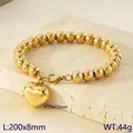 Golden stainless steel beaded bracelet featuring a smooth polished heart charm pendant. - Gold