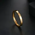Close-up detail of a minimalist gold stainless steel ring with sparkling micro-set stones - Size 5 / 2.5mm Six-Diamond Style / Gold