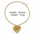 Gouden hartvormige ketting met een hanger met surrealistisch oog- en sterreliëf - Gezicht Ster Hart Hanger Stijl
