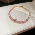 Elegante pulsera bañada en oro con piedras rosas talla baguette y cristal central halo - Estilo 54# Dorado Rosa Tenis