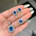 Detail view of an elegant royal blue tanzanite style necklace earrings and ring jewelry set - Light Blue Jewelry Set (With Chain)