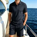 Detail view of navy blue mesh texture on men's summer polo and shorts set. - S / Top And Bottom / Dark Gray