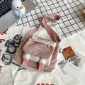 Piccola borsa a tracolla in tela rosa e beige per donna con dettaglio logo Fashion - Rosa