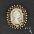 Vintage cameo beauty profile brooch with amber rhinestones on alloy base - Antique Gold