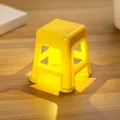 Luce notturna LED a forma di mini sgabello giallo e supporto per cellulare portatile decorativo. - Lampada sgabello / Giallo