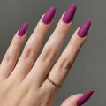 Elegant almond-shaped matte purple press-on nails displayed on a hand with gold ring - Almond Shape / Matte Purple (CDJ-5-85#1)