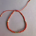Pulsera bohemia ajustable hecha a mano con cristales rojos y cuentas doradas - Rojo