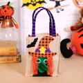 Sac à bonbons festif d'Halloween en toile de jute avec motif sorcière et anses rayées - Sac en Lin Sorcière