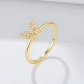 Macro view of a gold-plated s925 silver butterfly ring set with cubic zirconia - US 5 / Gold