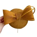 Elegant ginger yellow vintage fascinator hat with a large bow detail for banquets and parties - Gold