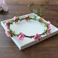 Corona de flores rosas etéreas para novias y damas de honor, perfecta para fotografía. - Rosa