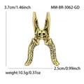 Broche creativo de pinzas doradas con calavera que muestra dimensiones y peso - Ancient gold-ancient gold 3062-gd