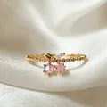 Elegant gold plated adjustable ring featuring iridescent gem and pink flower charm - Adjustable Open / Pink Five-Petal Flower Pendant (JZ044)