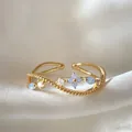 Elegant gold adjustable open ring with blue flowers and sparkling zircons on silk - Adjustable Open / Wave Light Blue Flower (JZ061)