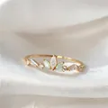 Elegant gold adjustable ring featuring leaf-shaped green and clear zircon stones. - Adjustable Open / Light Green Marquise Leaf Cluster (JZ051)
