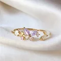 Adjustable gold butterfly ring with purple zircons and floral accents - Adjustable Open / Purple Butterfly Flower (JZ035)
