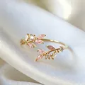 Elegant gold-tone adjustable open ring with leaf design and pink marquise zircons - Adjustable Open / Pink Marquise Leaves (JZ040)