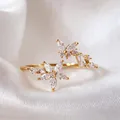 Elegant gold-tone open adjustable ring featuring zircon flower and butterfly details - Adjustable Open / Zirconia Flower Butterfly (JZ047)