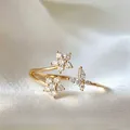 Elegant adjustable gold ring featuring sparkling zircon butterfly and floral designs. - Adjustable Open / Zirconia Butterfly Flower (JZ050)