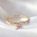 Sweet adjustable gold heart ring with a sparkling pink dangling zircon gemstone accent - Adjustable Open / Pink Heart Triangle Pendant (JZ054)