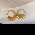 Elegant 18K gold plated U-shaped earrings featuring sparkling white zirconia stones - 63 Silver Post (Matte Gold U-shaped Pave Huggie) / Gold