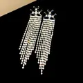 Elegant gold-plated zirconia long tassel earrings with geometric star top - 34 Silver Post (Star Cross Long Tassel-Gold) / Gold-Black
