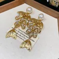 Elegant vintage gold-plated fish tail pearl dangle earrings with sparkling zircon stones - 32 Silver Post (Long Fishtail Artificial Pearl) / Gold-White