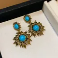 Vintage gold plated sunflower drop earrings featuring elegant blue turquoise center stones - 29 Silver Post (Sunflower Design Drop) / Gold-Blue