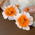 Artistic orange hibiscus flower drop earrings with handcrafted woven bead accent - 38 Silver Post (Orange-White Hibiscus) / Orange
