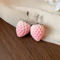 Unique pink strawberry stud earrings with real gold plating and soft flocked texture detail. - 48 Silver Post (Pink Flocking Strawberry) / Silver-Pink