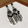 Elegant vintage silver-tone dangle earrings featuring black resin stones and long tassel chains - 56 Silver Post (Retro Black Long Tassel) / Black-Silver